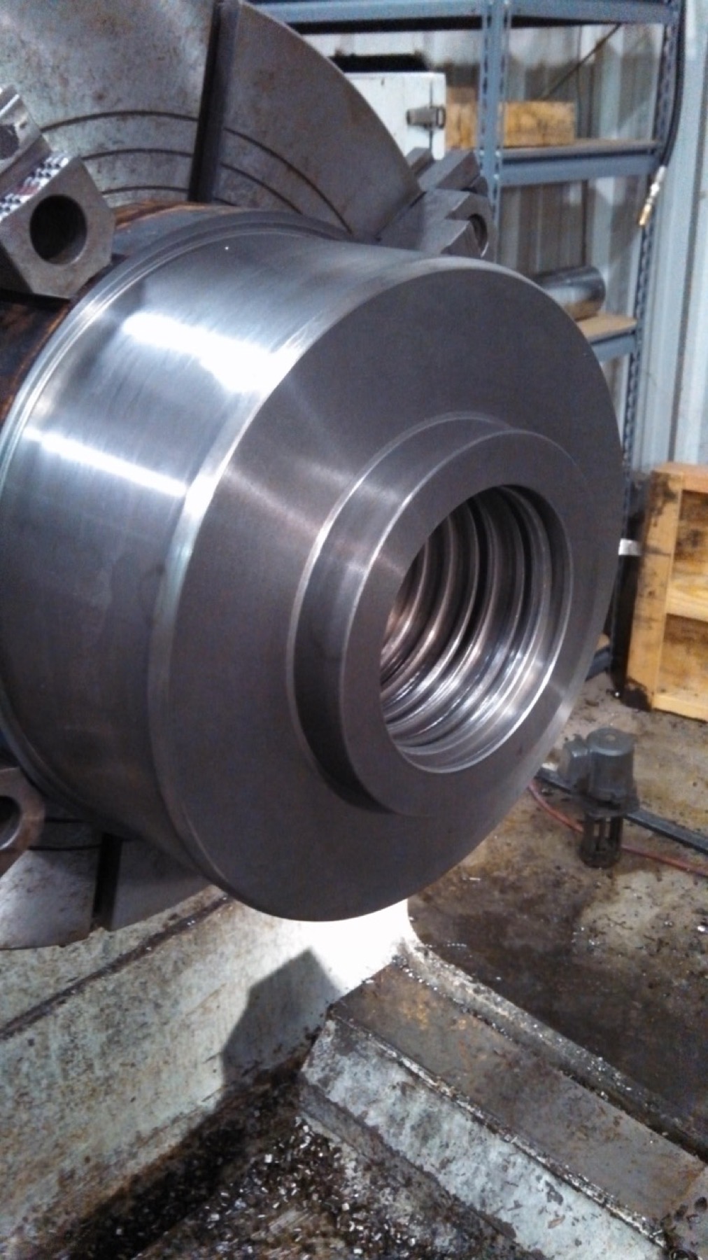 Custom cylinder head showing precision-machined internal seal grooves