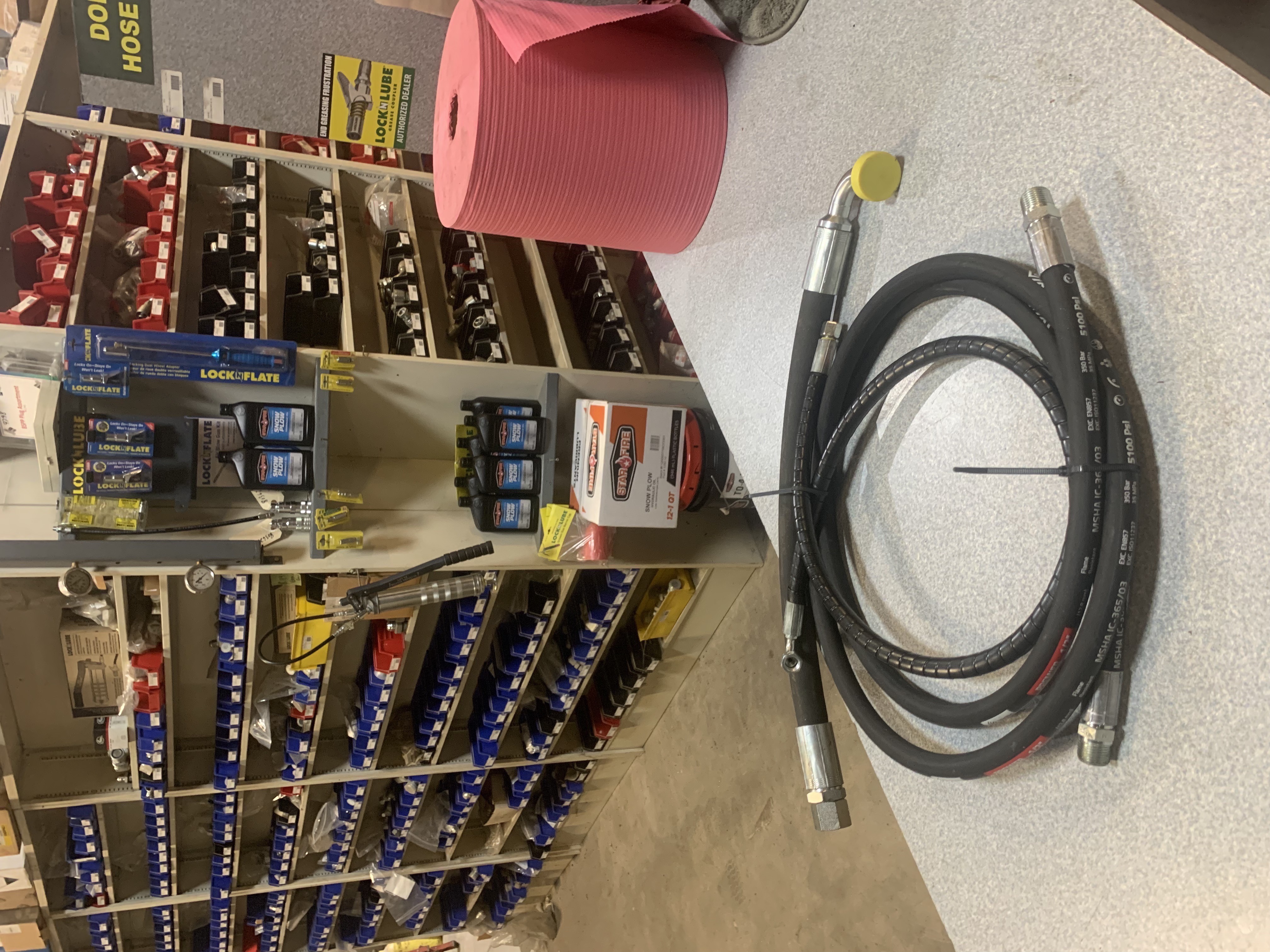 Completed custom hydraulic hose assembly with fittings attached