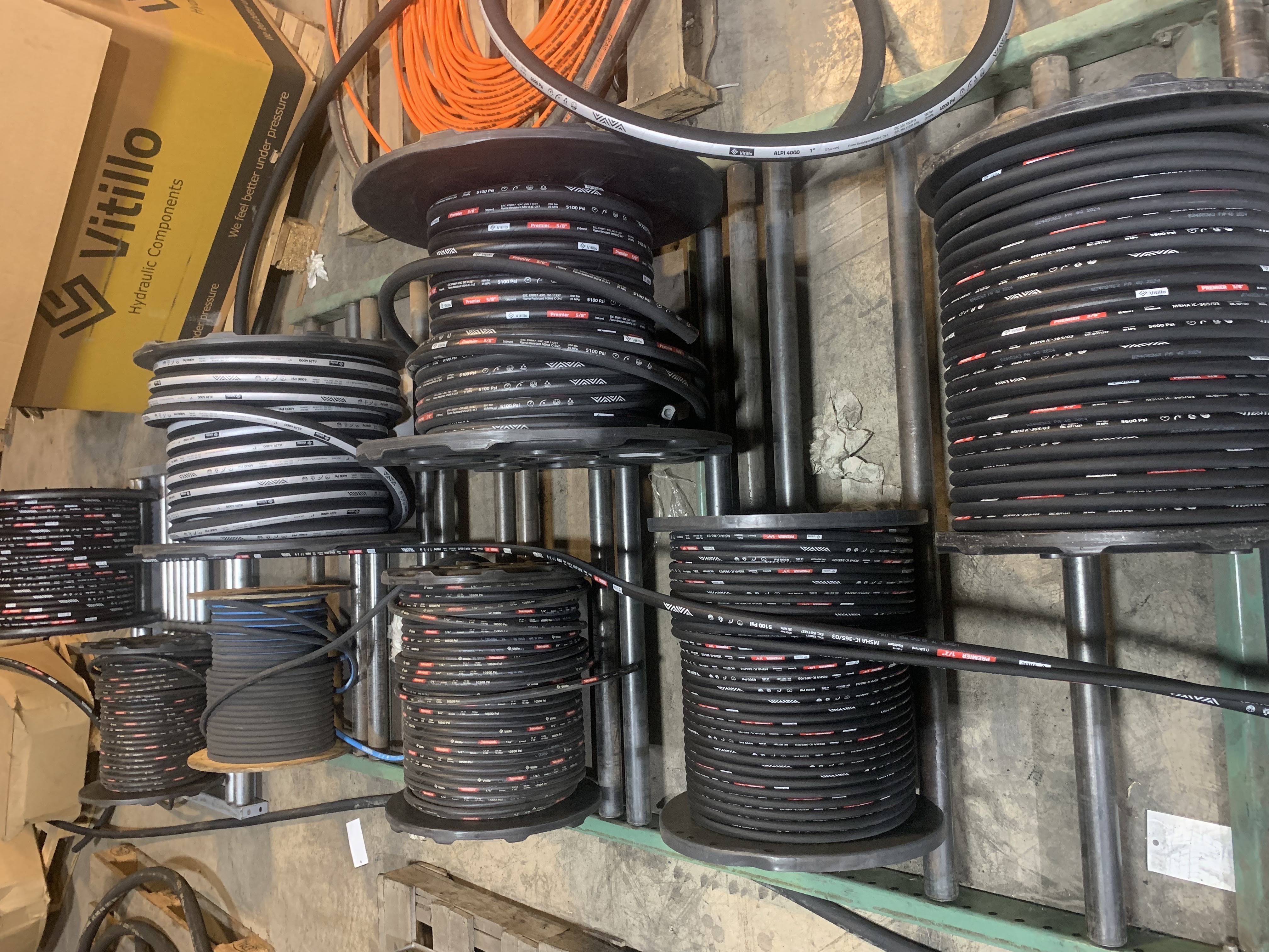 Vitillo hydraulic hose inventory on storage reels in shop